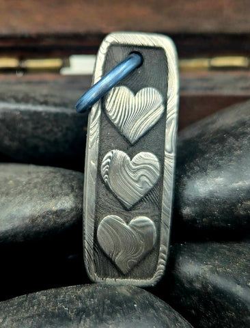 DAMASTEEL HEARTS PENDANT