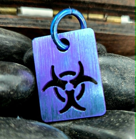 titanium zipper pull / pendant biohazard